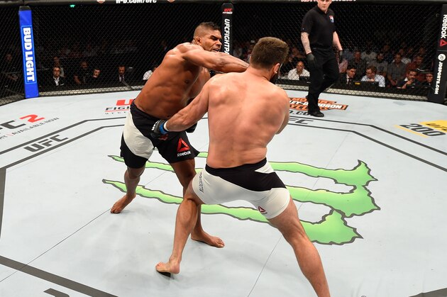 ROTTERDAM, NETHERLANDS - MAY 08:  (L-R) Alistair Overeem punches Andrei Arlovski in their heavyweight bout during the UFC Fight Night event at Ahoy Rotterdam on May 8, 2016 in Rotterdam, Netherlands. (Photo by Josh Hedges/Zuffa LLC/Zuffa LLC via Getty Images)