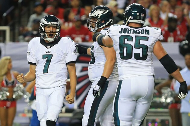 ATLANTA, GA - SEPTEMBER 14:  Sam Bradford #7 of the Philadelphia Eagles celebrates throwing a touchdown pass with Andrew Gardner #66 and Lane Johnson #65 during the second half against the Atlanta Falcons at the Georgia Dome on September 14, 2015 in Atlanta, Georgia.  (Photo by Daniel Shirey/Getty Images)