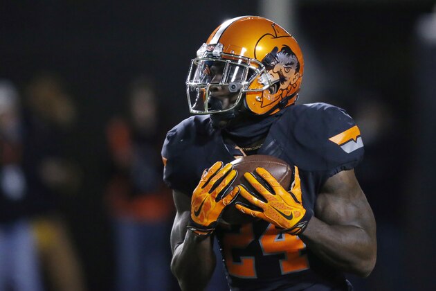 Oklahoma State's Tyreek Hill is pictured in the second quarter of an NCAA college football game against Texas in Stillwater, Okla., Saturday, Nov. 15, 2014. Texas won 28-7. (AP Photo/Sue Ogrocki)