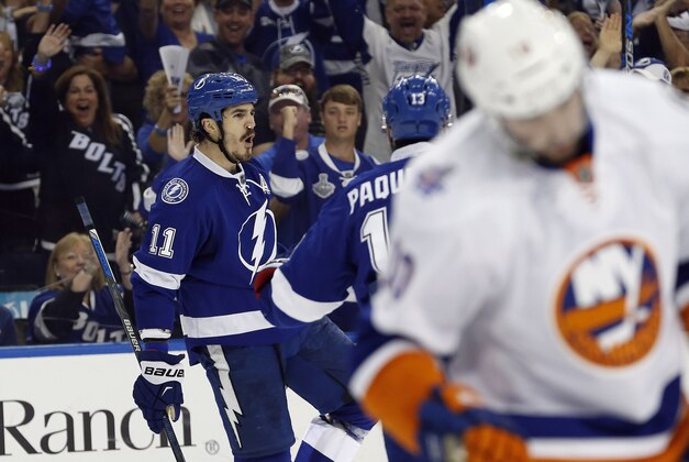 May 8, 2016; Tampa, FL, USA; Tampa Bay Lightning center Brian Boyle (11) is congratulated by center Cedric Paquette (13) celebrates after he scored a goal against the New York Islanders during the first period in game five of the second round of the 2016 Stanley Cup Playoffs at Amalie Arena. Mandatory Credit: Kim Klement-USA TODAY Sports