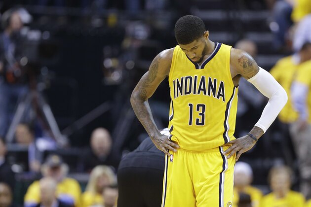 Indiana Pacers forward Paul George walks downcourt during a free-throw attempt by the Toronto Raptors during the first half of Game 3 of an NBA first-round playoff basketball series in Indianapolis, Thursday, April 21, 2016. (AP Photo/Michael Conroy)