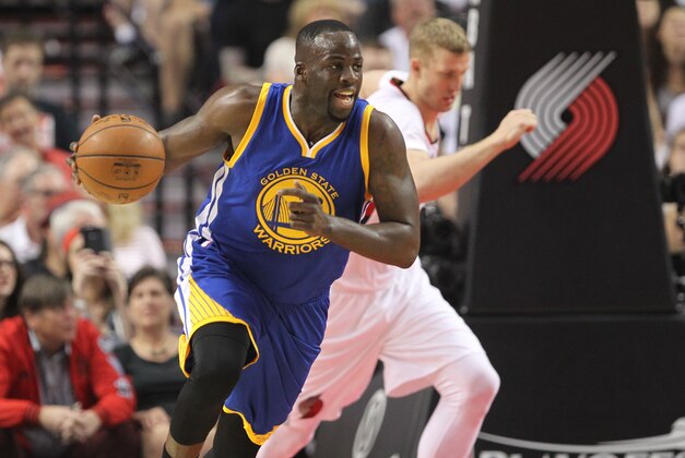 May 7, 2016; Portland, OR, USA; Golden State Warriors forward Draymond Green (23) pushes the ball up the court against the Portland Trail Blazers in game three of the second round of the NBA Playoffs at Moda Center at the Rose Quarter. Mandatory Credit: Jaime Valdez-USA TODAY Sports