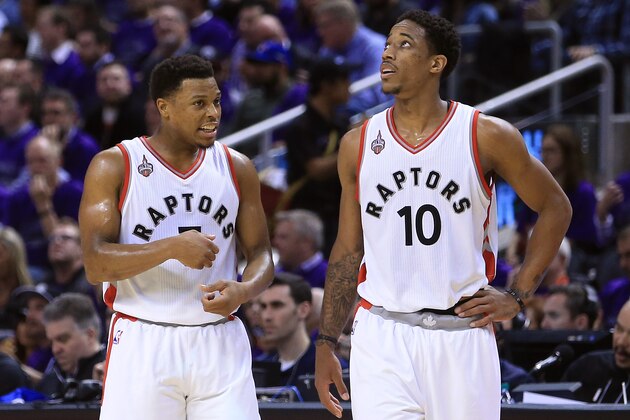 TORONTO, ON - APRIL 18:  Kyle Lowry #7 of the Toronto Raptors talks to teammate DeMar DeRozan #10 in the second half of Game Two of the Eastern Conference Quarterfinals against the Indiana Pacers during the 2016 NBA Playoffs at the Air Canada Centre on April 18, 2016 in Toronto, Ontario, Canada.  NOTE TO USER: User expressly acknowledges and agrees that, by downloading and or using this photograph, User is consenting to the terms and conditions of the Getty Images License Agreement.  (Photo by Vaughn Ridley/Getty Images)