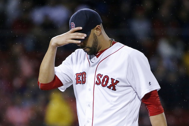 Boston Red Sox's David Price walks to the dug out after pitching during the third inning of a baseball game against the New York Yankees in Boston, Sunday, May 1, 2016. (AP Photo/Michael Dwyer)
