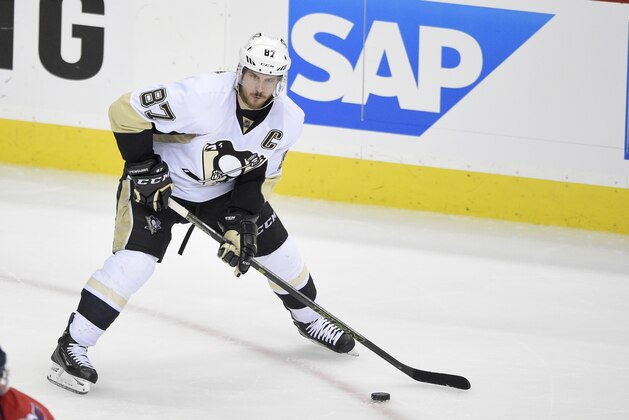 Pittsburgh Penguins center Sidney Crosby (87) skates with the puck during the second period of Game 5 in an NHL hockey Stanley Cup Eastern Conference semifinals against the Washington Capitals, Saturday, May 7, 2016, in Washington. (AP Photo/Nick Wass)