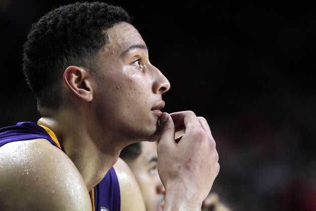 ADVANCE FOR WEEKEND EDITIONS, FEB. 27-28 - FILE -In this Feb. 23, 2016, file photo, LSU's Ben Simmons watches from the bench in the closing minutes of an NCAA college basketball game against Arkansas in Fayetteville, Ark. Simmons, presumptive No. 1 pick in the NBA draft, may never get a chance to showcase his talent on college basketball's biggest stage. That's because a late-season swoon has knocked LSU off the NCAA Tournament bubble. (AP Photo/Samantha Baker, File)