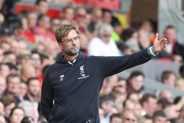 Liverpool's German manager Jurgen Klopp gestures during the English Premier League football match between Liverpool and Watford at Anfield in Liverpool, north west England on May 8, 2016. / AFP / LINDSEY PARNABY / RESTRICTED TO EDITORIAL USE. No use with unauthorized audio, video, data, fixture lists, club/league logos or 'live' services. Online in-match use limited to 75 images, no video emulation. No use in betting, games or single club/league/player publications.  /         (Photo credit should read LINDSEY PARNABY/AFP/Getty Images)