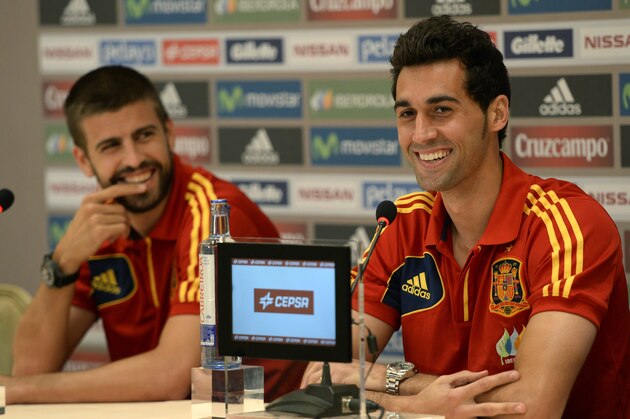 Spain national team players Gerard Pique (L) and Alvaro Arbeloa appear at a press conference in New York on June 10, 2013 on the eve of a friendly match between Spain and Ireland to be played at Yankee Stadium in the Bronx.    AFP PHOTO / TIMOTHY CLARY        (Photo credit should read TIMOTHY CLARY/AFP/Getty Images)