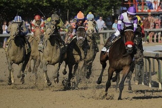 CORRECTS LAST NAME TO GUTIERREZ FROM GUITIERREZ - Mario Gutierrez rides Nyquist to victory during the 142nd running of the Kentucky Derby horse race at Churchill Downs Saturday, May 7, 2016, in Louisville, Ky. (AP Photo/Julio Cortez)