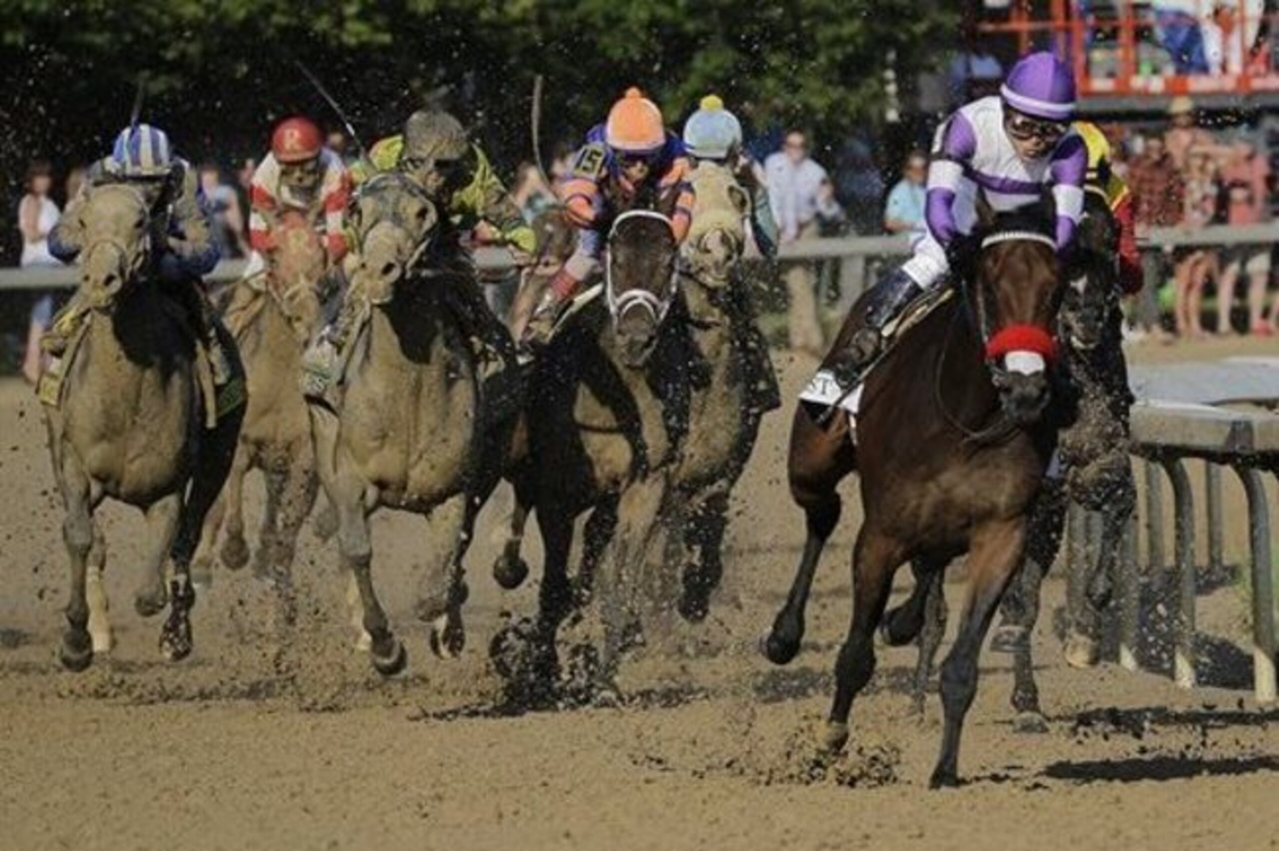 CORRECTS LAST NAME TO GUTIERREZ FROM GUITIERREZ - Mario Gutierrez rides Nyquist to victory during the 142nd running of the Kentucky Derby horse race at Churchill Downs Saturday, May 7, 2016, in Louisville, Ky. (AP Photo/Julio Cortez)