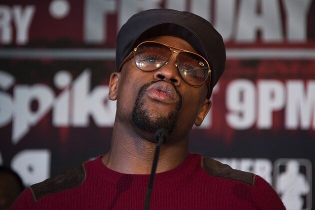 Promoter and former champion boxer Floyd Mayweather (C) speaks during a press conference announcing WBA super lightweight champion Adrien Broner's fight against Ashley Theophane, in Washington, DC, February 29, 2016.  
The title contest is scheduled to take place April 1, 2016 at the D.C. Armory in Washington DC. / AFP / JIM WATSON        (Photo credit should read JIM WATSON/AFP/Getty Images)