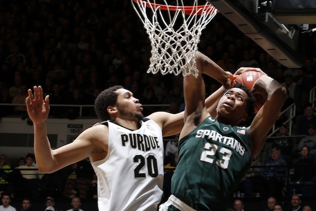 Feb 9, 2016; West Lafayette, IN, USA; Michigan State Spartans forward Deyonta Davis (23) has his shot blocked by Purdue Boilermakers center A.J. Hammons (20) at Mackey Arena. Purdue defeats Michigan State 82-81 in overtime. Mandatory Credit: Brian Spurlock-USA TODAY Sports Feb 9, 2016; West Lafayette, IN, USA; Michigan State Spartans forward Deyonta Davis (23) has his shot blocked by Purdue Boilermakers center A.J. Hammons (20) at Mackey Arena. Purdue defeats Michigan State 82-81 in overtime. Mandatory Credit: Brian Spurlock-USA TODAY Sports