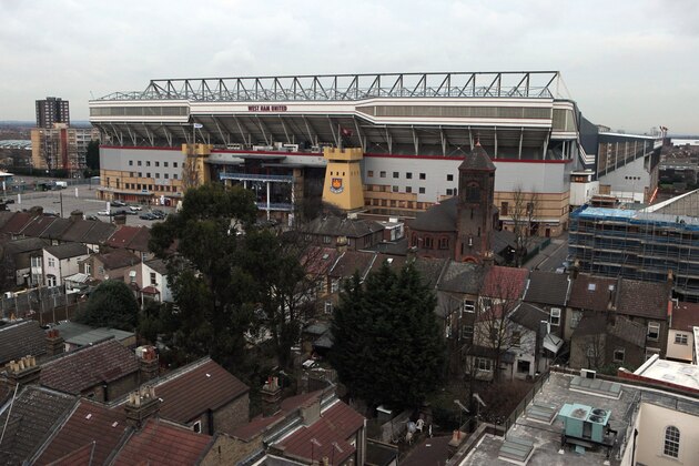 LONDON, ENGLAND - JANUARY 24:  West Ham United football club's Upton Park stadium in east London on January 24, 2011 in London, England. West Ham and Tottenham Hotspur Premier League football clubs are both bidding to take over the Olympic Stadium in Stratford after the 2012 Games. The Olympic Park Legacy Company will decide on the future of the 500m GBP, 80,000 seat stadium.  (Photo by Oli Scarff/Getty Images)