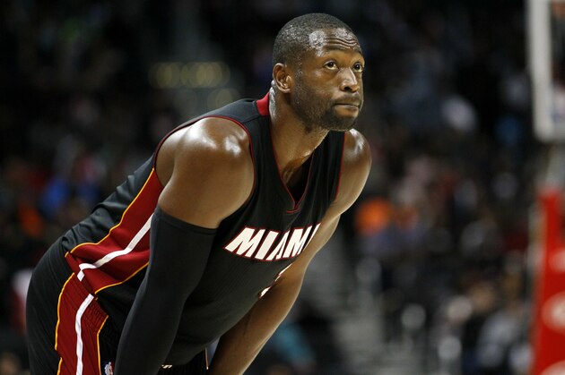 FILE - In this Oct. 18, 2015, file photo, Miami Heat guard Dwyane Wade (3) looks up during the first half of a preseason NBA basketball game against the Atlanta Hawks in Atlanta. Wade took to Twitter on Monday, May 2, 2016, after hearing Prince’s comment in a 2012 Australian radio interview that he was the late pop icon's favorite player. (AP Photo/Todd Kirkland, File)