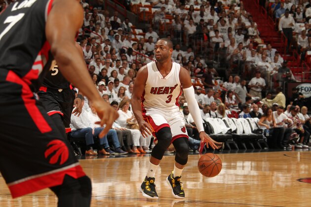 MIAMI, FL - MAY 9: Dwyane Wade #3 of the Miami Heat handles the ball against the Toronto Raptors in Game Four of the Eastern Conference Semifinals at AmericanAirlines Arena on May 9, 2016 in Miami, Florida. NOTE TO USER: User expressly acknowledges and agrees that, by downloading and or using this Photograph, user is consenting to the terms and conditions of the Getty Images License Agreement. Mandatory Copyright Notice: Copyright 2016 NBAE (Photo by Issac Baldizon/NBAE via Getty Images)