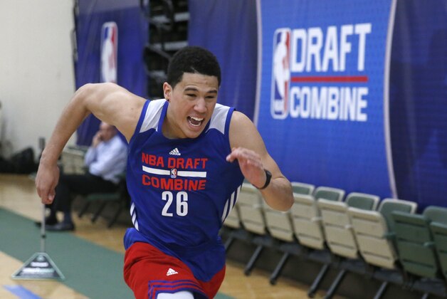 Kentucky's Devin Booker participates in the NBA basketball combine Friday, May 15, 2015, in Chicago. (AP Photo/Charles Rex Arbogast)