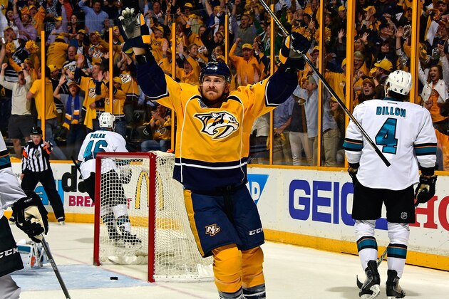 NASHVILLE, TN - MAY 09:  Colin Wilson #33 of the Nashville Predators holds his hands up in celebration after scoring the game tying goal during the third period of Game Six of the Western Conference Second Round against the San Jose Sharks during the 2016 NHL Stanley Cup Playoffs at Bridgestone Arena on May 9, 2016 in Nashville, Tennessee.  (Photo by Frederick Breedon/Getty Images)