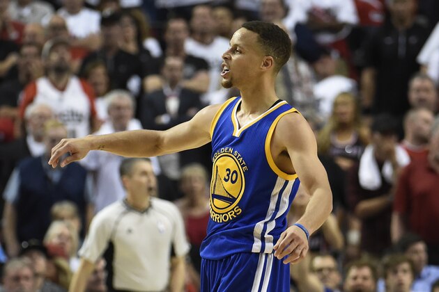 PORTLAND, OR - MAY 9: Stephen Curry #30 of the Golden State Warriors celebrates after hitting a shot during overtime  of Game Four of the Western Conference Semifinals against the Portland Trail Blazers during the 2016 NBA Playoffs at the Moda Center on May 9, 2016 in Portland, Oregon. The Warriors won 132-125. NOTE TO USER: User expressly acknowledges and agrees that by downloading and/or using this photograph, user is consenting to the terms and conditions of the Getty Images License Agreement.  (Photo by Steve Dykes/Getty Images)