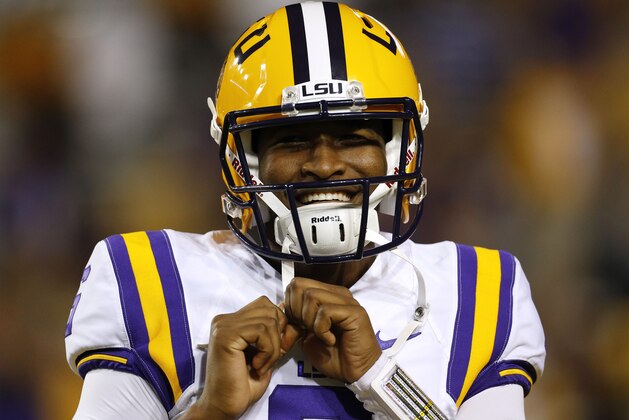 LSU quarterback Brandon Harris (6) warms up before an NCAA college football game against Texas A&M in Baton Rouge, La., Saturday, Nov. 28, 2015. (AP Photo/Jonathan Bachman)