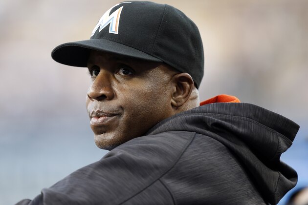 Miami Marlins hitting coach Barry Bonds stands in the dugout during the first inning of a baseball game against the Los Angeles Dodgers in Los Angeles, Wednesday, April 27, 2016. (AP Photo/Alex Gallardo)