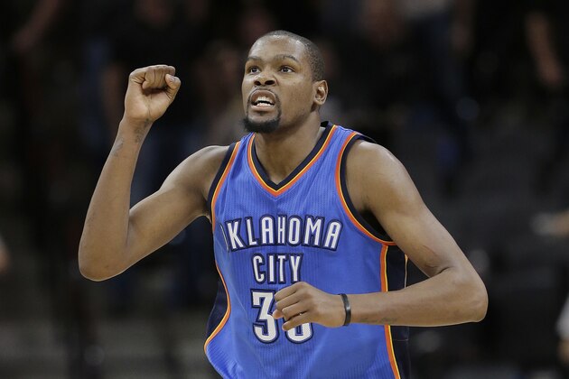 Oklahoma City Thunder forward Kevin Durant (35) celebrates a score against the San Antonio Spurs during the second half in Game 2 of a second-round NBA basketball playoff series, Monday, May 2, 2016, in San Antonio. Oklahoma City won 98-97. (AP Photo/Eric Gay)