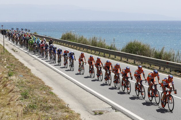 The pack rides during the 4th stage of 99th Giro d'Italia, Tour of Italy, from Catanzaro to Praia a Mare on May 10, 2016 in Praia a Mare, Italy.  / AFP / Luk BENIES        (Photo credit should read LUK BENIES/AFP/Getty Images)