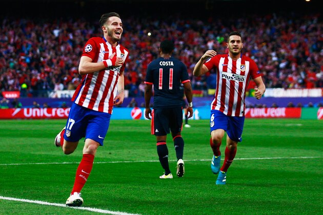 MADRID, SPAIN - APRIL 27:  Saul Niguez of Atletico Madrid (17) celebrates with team mates as he scores their first goal during the UEFA Champions League semi final first leg match between Club Atletico de Madrid and FC Bayern Muenchen at Vincente Calderon on April 27, 2016 in Madrid, Spain.  (Photo by Gonzalo Arroyo Moreno/Getty Images)
