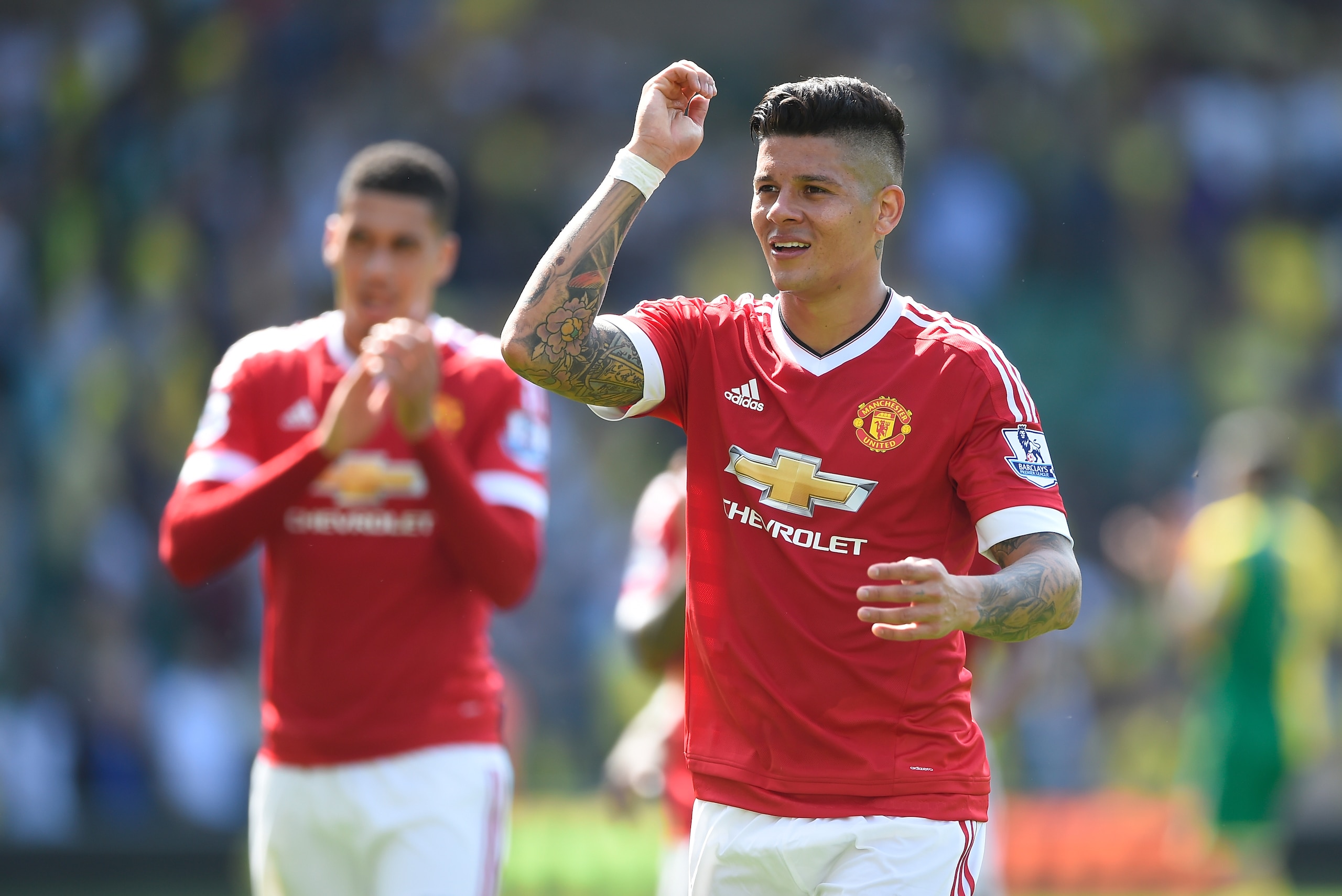 NORWICH, ENGLAND - MAY 07:  Marcos Roja of Manchester United celebrates his team's 1-0 win in the Barclays Premier League match between Norwich City and Manchester United at Carrow Road on May 7, 2016 in Norwich, England.  (Photo by Mike Hewitt/Getty Images)