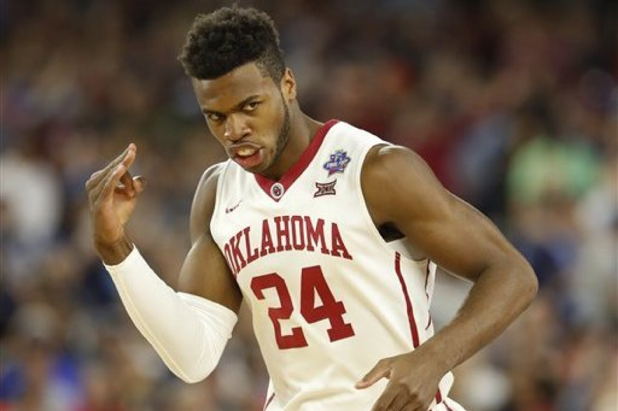Oklahoma's Buddy Hield reacts to a three point basket during the first half of the NCAA Final Four tournament college basketball semifinal game against Villanova, Saturday, April 2, 2016, in Houston. (AP Photo/Eric Gay)