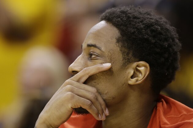 Toronto Raptors' DeMar DeRozan watches from the bench during the second half of Game 6 of an NBA first-round playoff basketball series against the Indiana Pacers, Friday, April 29, 2016, in Indianapolis. (AP Photo/Darron Cummings)