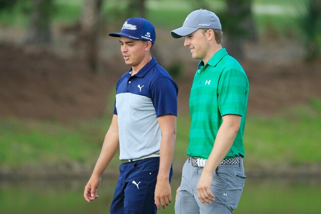 PONTE VEDRA BEACH, FL - MAY 10:  Rickie Fowler and Jordan Spieth walk down a fairway together during a practice round prior to the start of the THE PLAYERS Championship on the Stadium Course at TPC Sawgrass on May 10, 2016 in Ponte Vedra Beach, Florida.  (Photo by Scott Halleran/Getty Images)