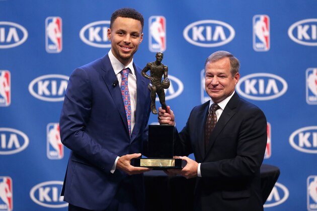 OAKLAND, CA - MAY 10:  Stephen Curry of the Golden State Warriors is awarded the NBA Most Valuable Player Award by Greg Grulikowski from Kia Motors during a press conference at ORACLE Arena on May 10, 2016 in Oakland, California.   NOTE TO USER: User expressly acknowledges and agrees that, by downloading and or using this photograph, User is consenting to the terms and conditions of the Getty Images License Agreement.  (Photo by Ezra Shaw/Getty Images)