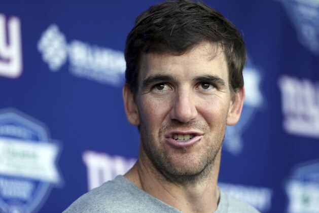 New York Giants quarterback Eli Manning answers a question after an NFL football minicamp Wednesday, April 27, 2016, in East Rutherford, N.J. (AP Photo/Mel Evans)