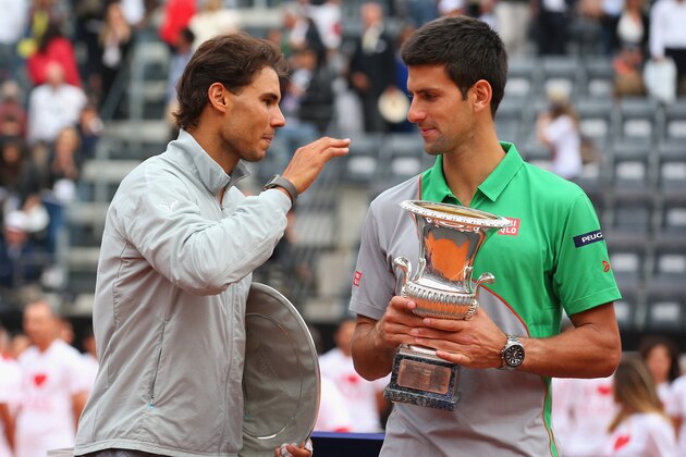 ROME, ITALY - MAY 18:  Novak Djokovic of Serbia with the winners trophy next to runner up Rafael Nadal of Spain after the final during day eight of the Internazionali BNL d'Italia tennis 2014 on May 18, 2014 in Rome, Italy.  (Photo by Julian Finney/Getty Images)