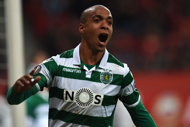 Sporting's Joao Mario celebrates scoring the 1-1 during the UEFA Europa League, Round of 32 match football between Bayer Leverkusen and Sporting Lisbon in Leverkusen, western Germany on February 25, 2016.  / AFP / PATRIK STOLLARZ        (Photo credit should read PATRIK STOLLARZ/AFP/Getty Images)