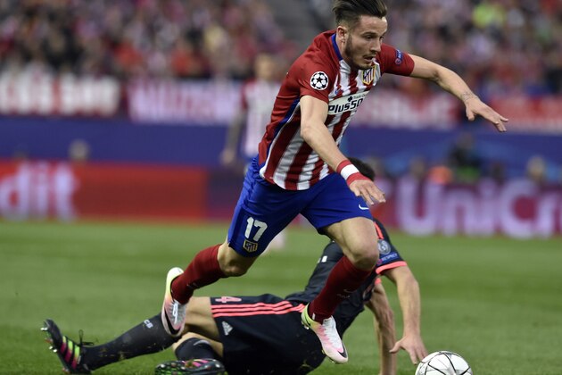 Atletico Madrid's midfielder Saul Niguez jumps over another player during the UEFA Champions League semi-final first leg football match Club Atletico de Madrid vs Bayern Munich at the Vicente Calderon stadium in Madrid on April 27, 2016. / AFP / GERARD JULIEN (Photo credit should read GERARD JULIEN/AFP/Getty Images) Atletico Madrid's midfielder Saul Niguez jumps over another player during the UEFA Champions League semi-final first leg football match Club Atletico de Madrid vs Bayern Munich at the Vicente Calderon stadium in Madrid on April 27, 2016. / AFP / GERARD JULIEN (Photo credit should read GERARD JULIEN/AFP/Getty Images)
