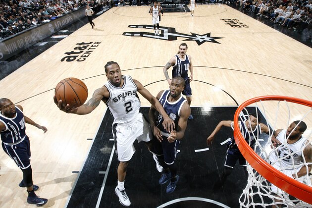 SAN ANTONIO, TX - APRIL 30: Kawhi Leonard #2 of the San Antonio Spurs goes for the lay up during the game against the Oklahoma City Thunder in Game One of the Western Conference Semifinals during the 2016 NBA Playoffs on April 30, 2016 at the AT&T Center in San Antonio, Texas. NOTE TO USER: User expressly acknowledges and agrees that, by downloading and or using this photograph, user is consenting to the terms and conditions of the Getty Images License Agreement. Mandatory Copyright Notice: Copyright 2016 NBAE (Photos by Chris Covatta/NBAE via Getty Images)