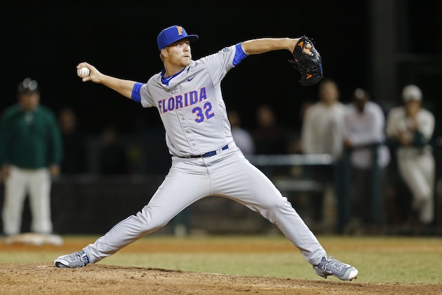 CORAL GABLES, FL - FEBRUARY 26: Logan Shore #32 of the Florida Gators throws the ball against the Miami Hurricanes in the ninth inning on February 26, 2016 at Alex Rodriguez Park at Mark Light Field in Coral Gables, Florida. Florida defeated Miami 5-0. (Photo by Joel Auerbach/Getty Images)