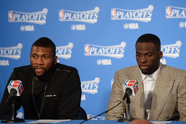 OAKLAND, CA - MAY 3: Festus Ezeli #31 and Draymond Green #23 of the Golden State Warriors talks with the press after the game against the Portland Trail Blazers in Game Two of the Western Conference Semifinals during the 2016 NBA Playoffs on May 3, 2016 at Oracle Arena in Oakland, California. NOTE TO USER: User expressly acknowledges and agrees that, by downloading and or using this photograph, user is consenting to the terms and conditions of Getty Images License Agreement. Mandatory Copyright Notice: Copyright 2016 NBAE (Photo by Garrett Ellwood/NBAE via Getty Images)
