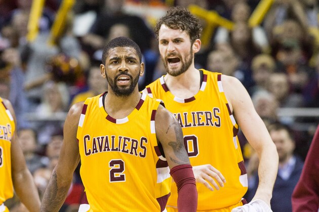 CLEVELAND, OH - APRIL 11: Kyrie Irving #2 and Kevin Love #0 of the Cleveland Cavaliers celebrate during the second half against the Atlanta Hawks at Quicken Loans Arena on April 11, 2016 in Cleveland, Ohio. The Cavaliers defeated the Hawks 109-94. NOTE TO USER: User expressly acknowledges and agrees that, by downloading and or using this photograph, User is consenting to the terms and conditions of the Getty Images License Agreement. (Photo by Jason Miller/Getty Images)