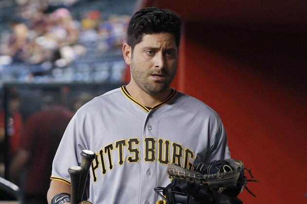 Pittsburgh Pirates' Francisco Cervelli walks through the dugout prior to a baseball game against the Arizona Diamondbacks Friday, April 22, 2016, in Phoenix.  The Pirates defeated the Diamondbacks 8-7. (AP Photo/Ross D. Franklin)