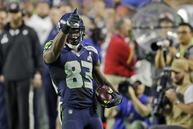 Seattle Seahawks wide receiver Ricardo Lockette (83) points after the Seahawks scored during the first half of NFL Super Bowl XLIX football game Sunday, Feb. 1, 2015, in Glendale, Ariz. (AP Photo/Brynn Anderson)