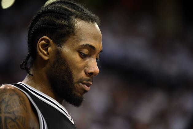 May 8, 2016; Oklahoma City, OK, USA; San Antonio Spurs forward Kawhi Leonard (2) reacts after a play against the Oklahoma City Thunder during the fourth quarter in game four of the second round of the NBA Playoffs at Chesapeake Energy Arena. Mandatory Credit: Mark D. Smith-USA TODAY Sports