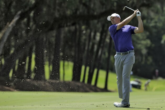 Jordan Spieth hits from the 15th fairway during a practice round for The Players Championship golf tournament Wednesday, May 11, 2016, in Ponte Vedra Beach, Fla. (AP Photo/Chris O'Meara)