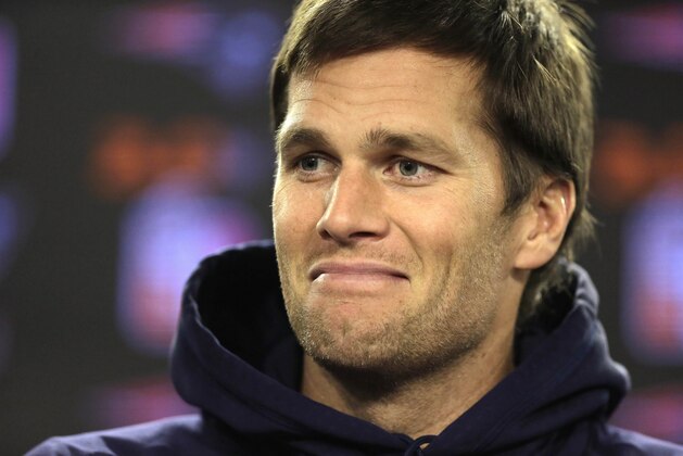 FILE - In this Jan. 6, 2016, file photo, New England Patriots quarterback Tom Brady smiles while facing reporters before a scheduled NFL football practice in Foxborough, Mass. A cookbook offered for $200 on Brady's website has sold out. (AP Photo/Steven Senne, File) FILE - In this Jan. 6, 2016, file photo, New England Patriots quarterback Tom Brady smiles while facing reporters before a scheduled NFL football practice in Foxborough, Mass. A cookbook offered for $200 on Brady's website has sold out. (AP Photo/Steven Senne, File)