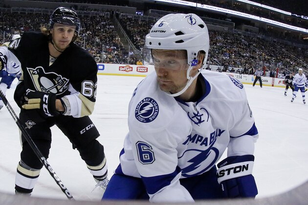 Tampa Bay Lightning defenseman Anton Stralman (6) and Pittsburgh Penguins left wing Carl Hagelin (62) play during an NHL hockey game against the Pittsburgh Penguins in Pittsburgh, Saturday, Feb. 20, 2016. (AP Photo/Gene J. Puskar)