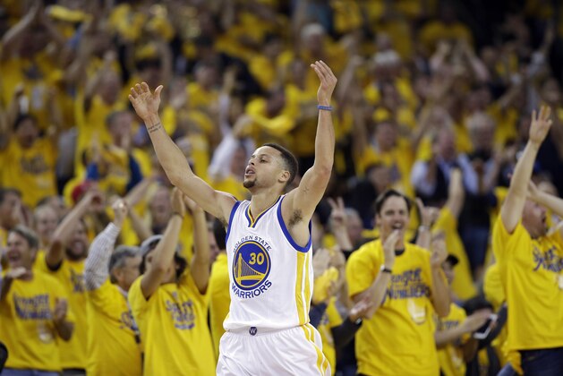 Golden State Warriors' Stephen Curry (30) celebrates after scoring against the Portland Trail Blazers during the first half in Game 5 of a second-round NBA basketball playoff series Wednesday, May 11, 2016, in Oakland, Calif. (AP Photo/Marcio Jose Sanchez)