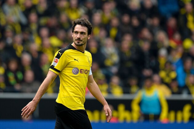 Dortmund's defender Mats Hummels reacts during the German first division Bundesliga football match Borussia Dortmund vs VfL Wolfsburg, in Dortmund, western Germany, on April 30, 2016. / AFP / Sascha SCHï¿½ï¿½ï¿½ï¿½ï¿½ï¿½RMANN / RESTRICTIONS: DURING MATCH TIME: DFL RULES TO LIMIT THE ONLINE USAGE TO 15 PICTURES PER MATCH AND FORBID IMAGE SEQUENCES TO SIMULATE VIDEO. == RESTRICTED TO EDITORIAL USE == FOR FURTHER QUERIES PLEASE CONTACT DFL DIRECTLY AT + 49 69 650050
        (Photo credit should read SASCHA SCHURMANN/AFP/Getty Images)