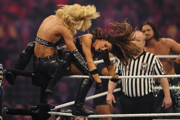 WWE Divas LayCool and Trish Stratus during WrestleMania XXVII at the Georgia Dome in Atlanta, Georgia on Sunday, April 3, 2011. (Paul Abell/AP Images for WWE)