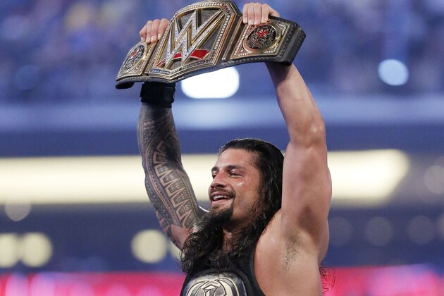 IMAGE DISTRIBUTED FOR WWE - WWE superstar new world heavy weight champion Roman Reigns celebrates his victory at WrestleMania 32 at AT&T Stadium on Sunday, April 3, 2016, in Arlington, Texas. (Brandon Wade/AP Images for WWE)